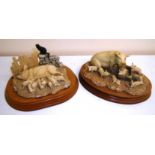 Two Border Fine Arts pig figures on plinths including 'Moses & Bertha'