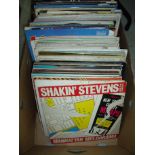 Box containing a large selection of various LP records including 'Shakin Stevens', 'Neil Sedaka',