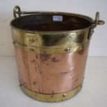 Small brass and copper riveted bucket with swing handle (28cm diameter)