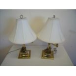 Pair of heavy brass desk lamps with square bases and adjustable arms