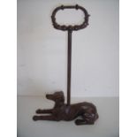 Cast metal door stop in the form of a seated greyhound/lurcher