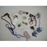 Selection of various costume jewellery including gemstone necklaces, glass necklaces, tiger eye,