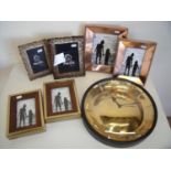 Modern ex-shop display gold and black wall clock and a selection of various assorted photo frames (