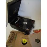 Portable wind-up His Masters Voice record player and a large selection of various classical and