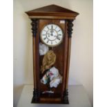 Walnut cased double weighted Vienna style wall clock with white enamel dial