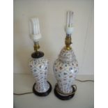 Porcelain table lamp on turned wood bases