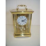 Modern gilt cased Bentima German made mantel clock (28cm high)