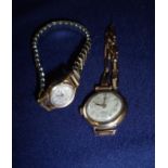 18ct gold cased MuDu ladies wrist watch with plated expanding bracelet strap and another 9ct gold