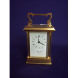 Morrell & Hilton of Huntington brass cased carriage clock enclosed by five bevel edged glazed panels