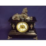 Victorian japed metal cased chiming mantel clock crested with figure of a Sphinx with lion mask