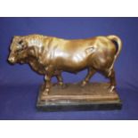 Large bronze figure of a bull on rectangular marble base (48cm x 19cm x 34cm)