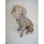 Modern composite driftwood style figure of a seated dog (40cm high)