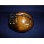 Small polished carved wood Coco De Mer figure (12cm x 11cm x 8cm)