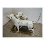 Unusual and large extremely heavy cast metal garden statutory figures of two working dogs, one