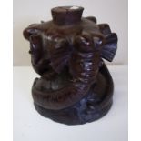 Carved African hardwood pedestal formed from three carved elephant heads (36cm high)