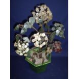 20th C Chinese carved hardstone potted hydrangea in green glazed base (height 53cm)