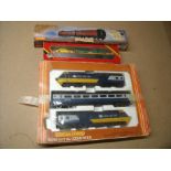 Boxed Hornby OO gauge Intercity 125 set, a R126 car transporter and a Hogwarts Express coach