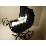 Wooden constructed Victorian style coach built dolls pram with porcelain headed Alberon doll