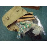Canvas haversack type bag with various rabbit snares