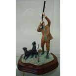 Border Fine Arts figure of a game shooter and two seated Labradors, mounted on wooden plinth