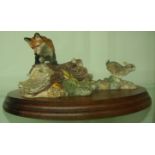 Border Fine Arts figure of a fox and hare (hare lacking an ear), mounted on oval wooden plinth