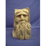 Early French style carved wood figure of a bearded man carved from a tree branch retaining bark to
