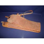 Gunmark canvas and leather bound gun slip with leather shoulder strap and wool lining