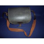 High quality leather cartridge bag with large folder over flap, with lined interior and side