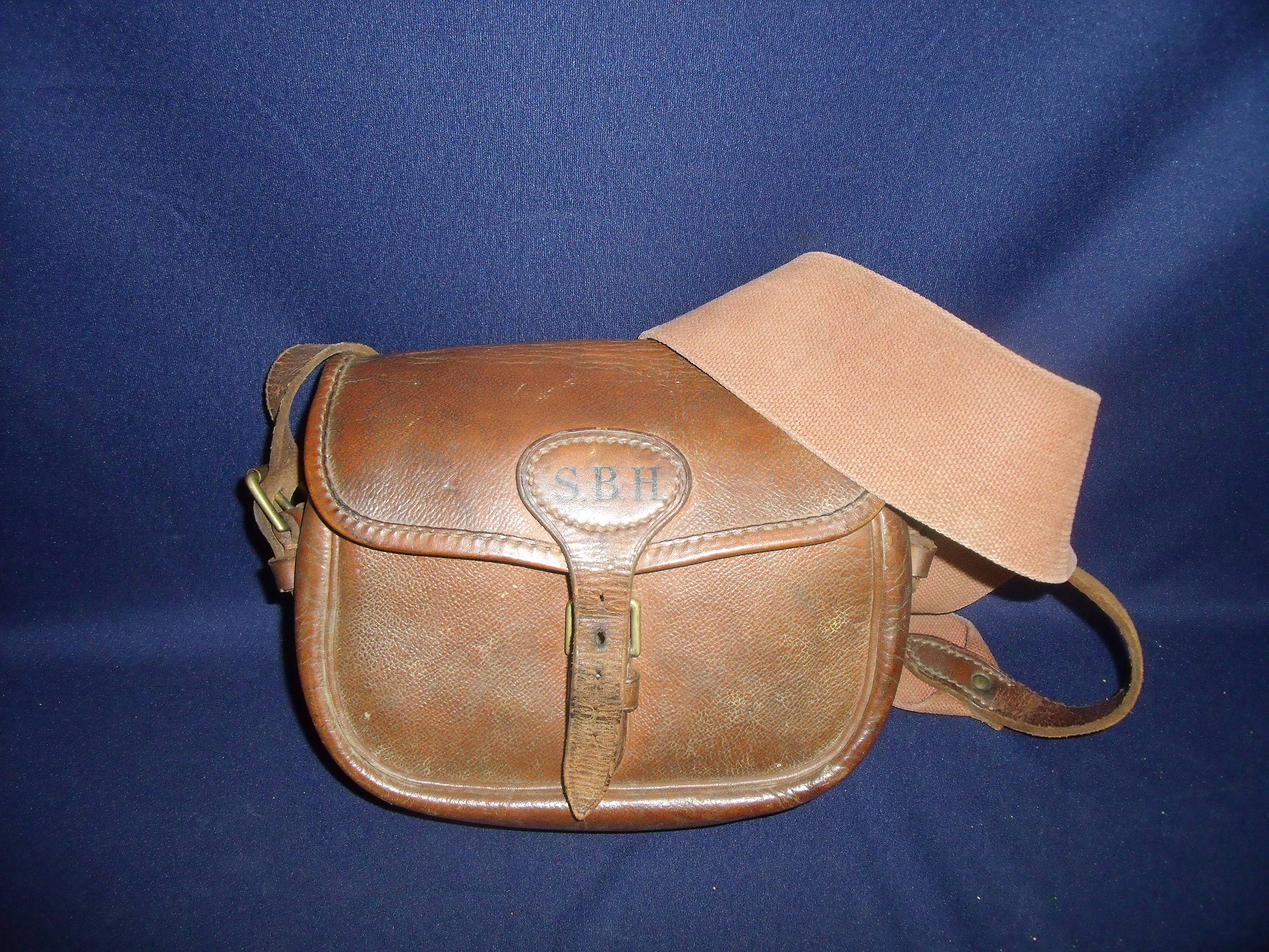 Brady tan leather cartridge bag, the back stamped Warranted Cow Hide Payne Galwey, with leather