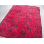 Large red ground Persian style rug (225cm x 180cm)