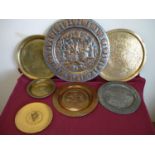 Extremely large Indian white metal and brass charger and a selection of other brass chargers