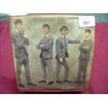 Vinyl Tote record case featuring The Beatles and a selection of various 45 records including Billy J