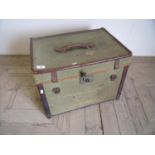 Vintage canvas and leather trimmed travelling trunk with star painted detail to the side and heavy