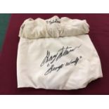 Pair of jockeys trousers signed by Gary Stevens and another pair of jockey trousers embroidered with