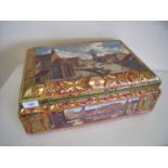 Large German embossed E. Otto Schmidt tin with town landscape scenes and hinged rectangular top (