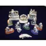 Group of 19th C and later figures of cats including two pairs marked with gold anchor to the base