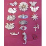 Collection of various silver brooches of various designs including butterflies, seahorses etc