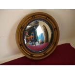 Gilt framed 19th C style convex wall mirror (diameter 42cm)