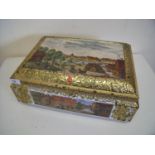 Large German embossed E. Otto Schmidt tin with town landscape scenes and hinged rectangular top (