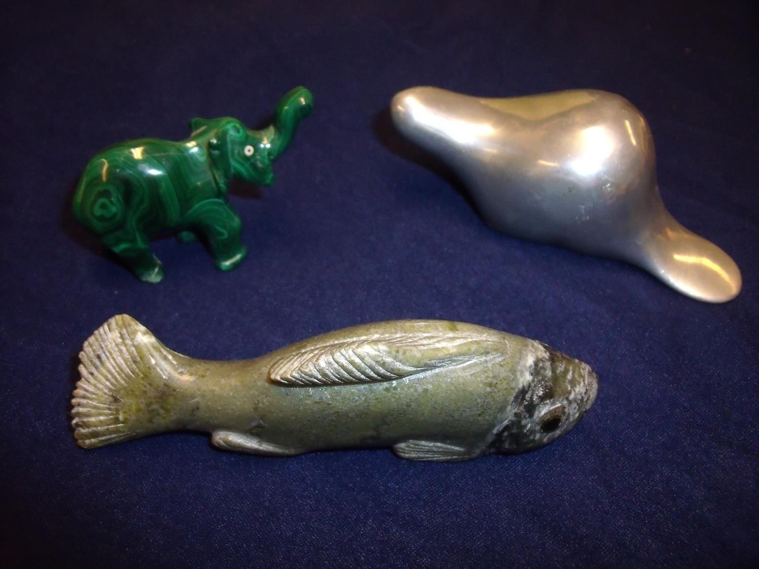 Small carved malachite elephant, a Studio ware signed stainless steel figure of a beaver and a