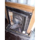 Light oak fire surround with cast metal Victorian style insert with a selection of Victorian style