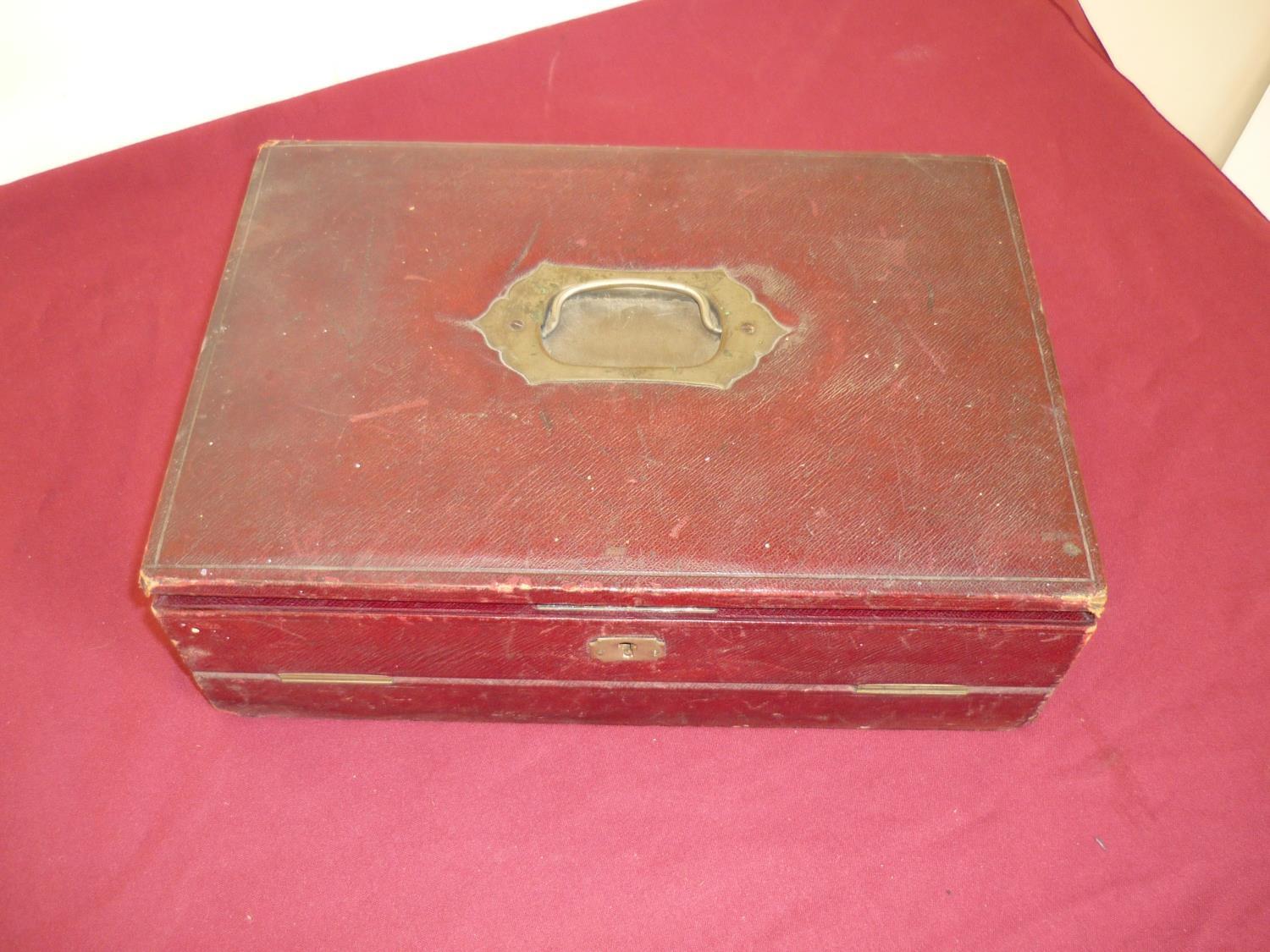 Leather travelling writing box with inset handle and fitted interior, complete with inkwell (31cm