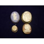 Group of Cameo brooches including Victorian yellow metal mounted cameo brooch of a lady and dog in