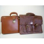 Two brown leather satchels
