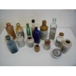 Selection of various glass and stoneware bottles including blue poison bottle, Scarborough Brewery