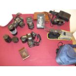 Selection of cameras and camera equipment including cased Nikon F50 with Sigma Zoom 24-70mm lens,
