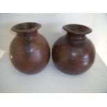 Pair of turned wood African tribal style vases with flare circular rims (30cm high)