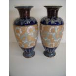 Pair of Royal Doulton Stoneware vases with various stamp marks to the base (44cm high)
