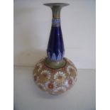 Royal Doulton stoneware vase with tapered neck and flared rim on bulbous body, the base stamped with