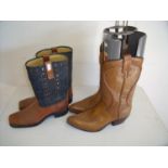 Two pairs of Western cowboy style boots including Texas Steel tan leather & denim and Dan Post brown